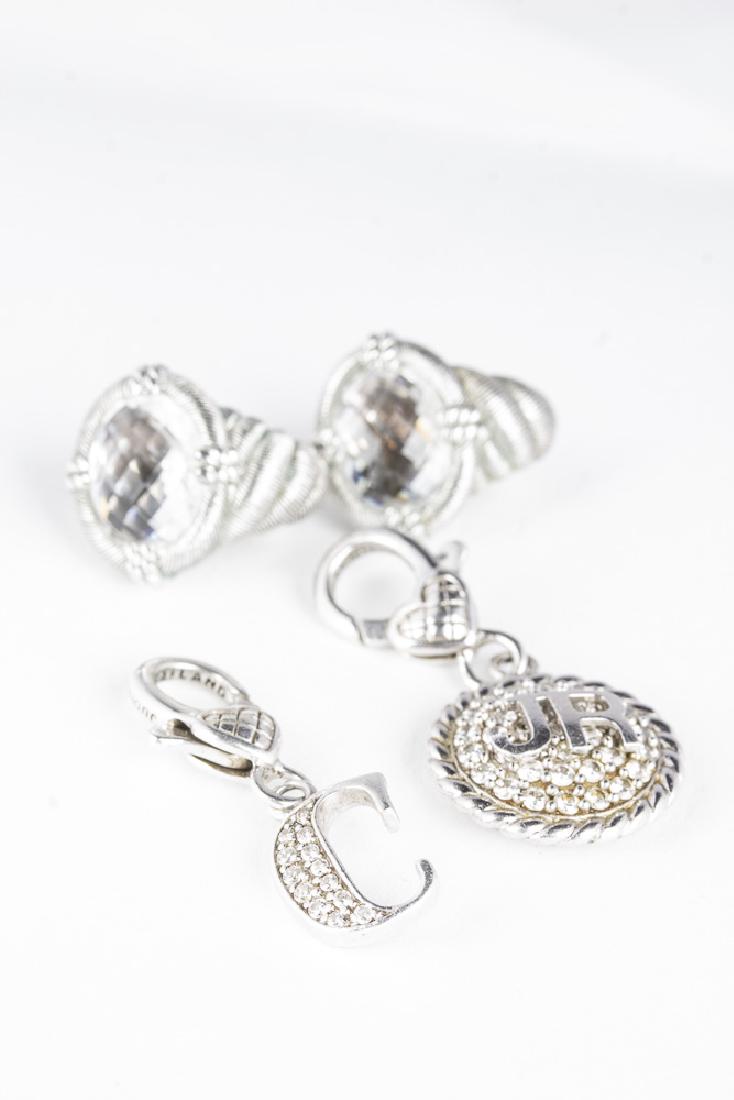 JUDITH RIPKA Fleur Sterling Pendant & Earrings: Collection of Judith Ripka Fleur de Lis jewelry. Sterling charm/pendant, 3/4" in diameter, with JR on one side and a fleur de lie on the opposite. 5.98g. Sterling earrings with modified cornucopia des