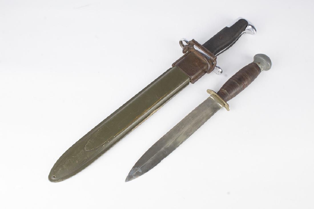 WW2 USA Bayonet and SOS Style Fighting Knife: WW2 USA bayonet is 14 1/4" overall with a 9 3/4" blade. Blade is stamped PAL, US with emblem in between, 1943. Comes with hard side sheath marked with same emblem as blade. SOS style fighting knife is