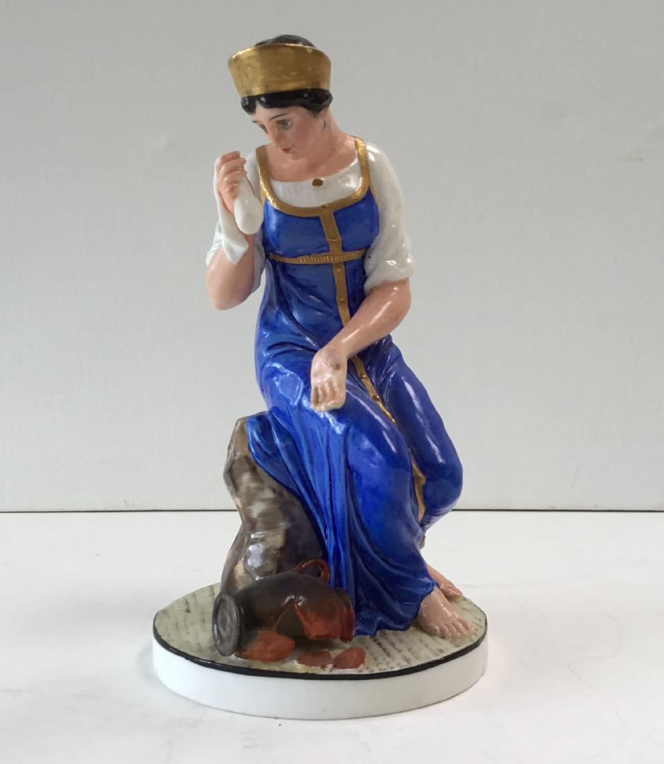PORCELAIN FIGURINE OF WOMAN (1 of 4)