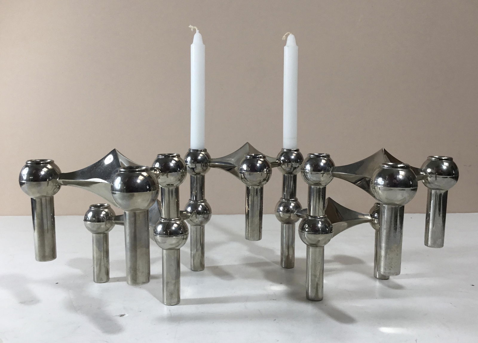 CHROMED NICKEL MODULAR STACKING CANDLEHOLDERS NAGEL: Set of five model S22 candlestick holders from Stoffi and Nagel, German 1960s designed for Bayerische Metallwaren Fabrik by Caesar Stoffi and Fritz Nagel. They can be configured both vertically and ho