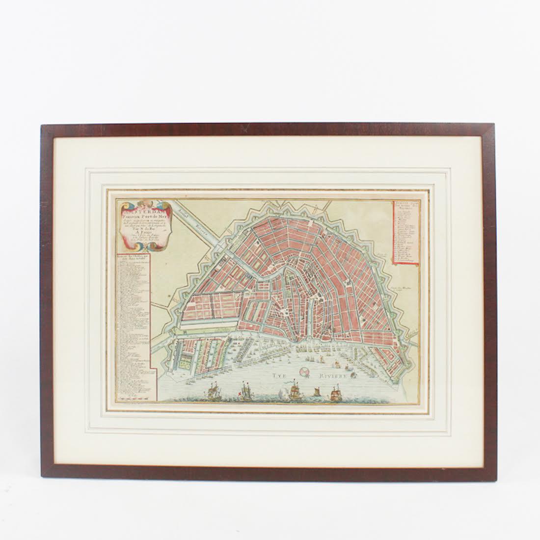 1705 Original Engraved Map of Amsterdam by N. de Fer: An original copper engraved hand-colored map of Amsterdam by French cartographer Nicolas de Fer (1646-1720). This map was published in Paris in 1705. It was engraved and printed by Dutch-American illu