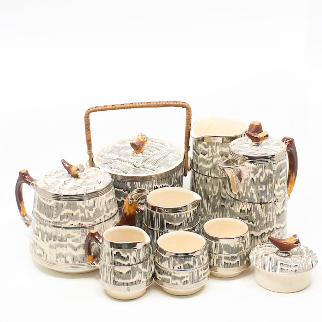 Antique Arthur Wood "Silver Shield" Set: An antique Arthur Wood "Silver Shield" set. This set features a transferware wood grain design and hand-painted faux antler handles/finials. Each piece is marked "Arthur Wood England Silver Shield" on