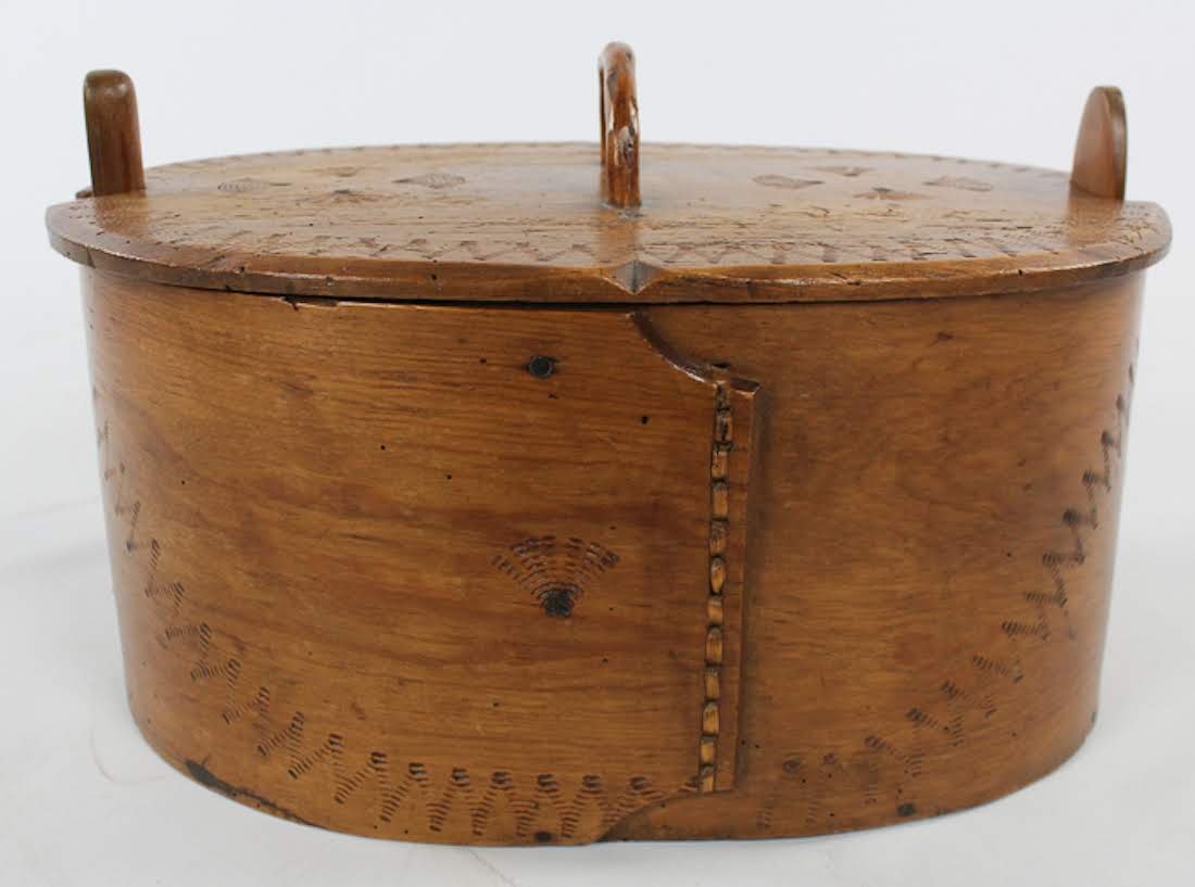 Antique Swedish Hand-Carved Bentwood Tina Box: An antique Swedish bentwood Tina Svepask box. This piece features hand-carved designs on the lid and body. It is unmarked. Dimensions: 6 x 16.5 x 11 Flat Rate Shipping (not calculated):