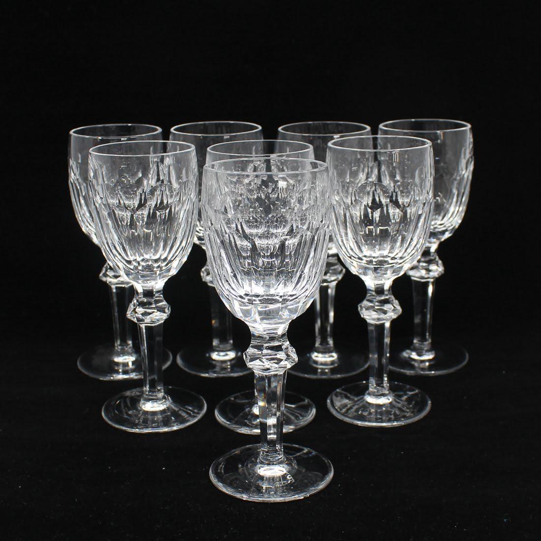 Waterford "Curraghmore" Red Wine Glasses: A set of eight Waterford crystal red wine glasses. These glasses feature the "Curraghmore" pattern. Each is marked "Waterford" on the underside. Dimensions: 6.75 x 2.75 x 2.75 (for one) Flat Rate Ship