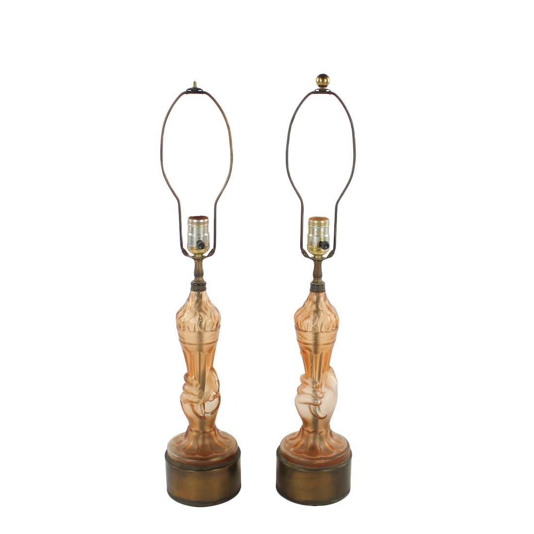Pair of Art Deco Liberty Torch Lamps: A pair of antique Art Deco Liberty Torch lamps. Each lamp take the form of a hand holding a torch. They are unmarked. Dimensions: 26.5 x 5 x 5 (for one) Flat Rate Shipping (not calculated):