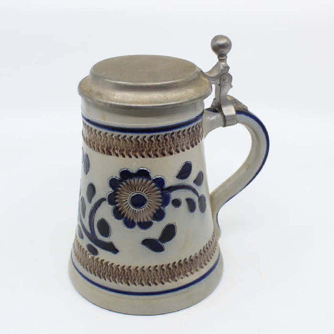 Goebel Merkelbach Salzglasur German Stein: A vintage Goebel Merkelbach Salzglasur stein made in Germany. It is signed by the artist on the underside. Dimensions: 7 x 6.5 x 4.75 Flat Rate Shipping (not calculated): $15