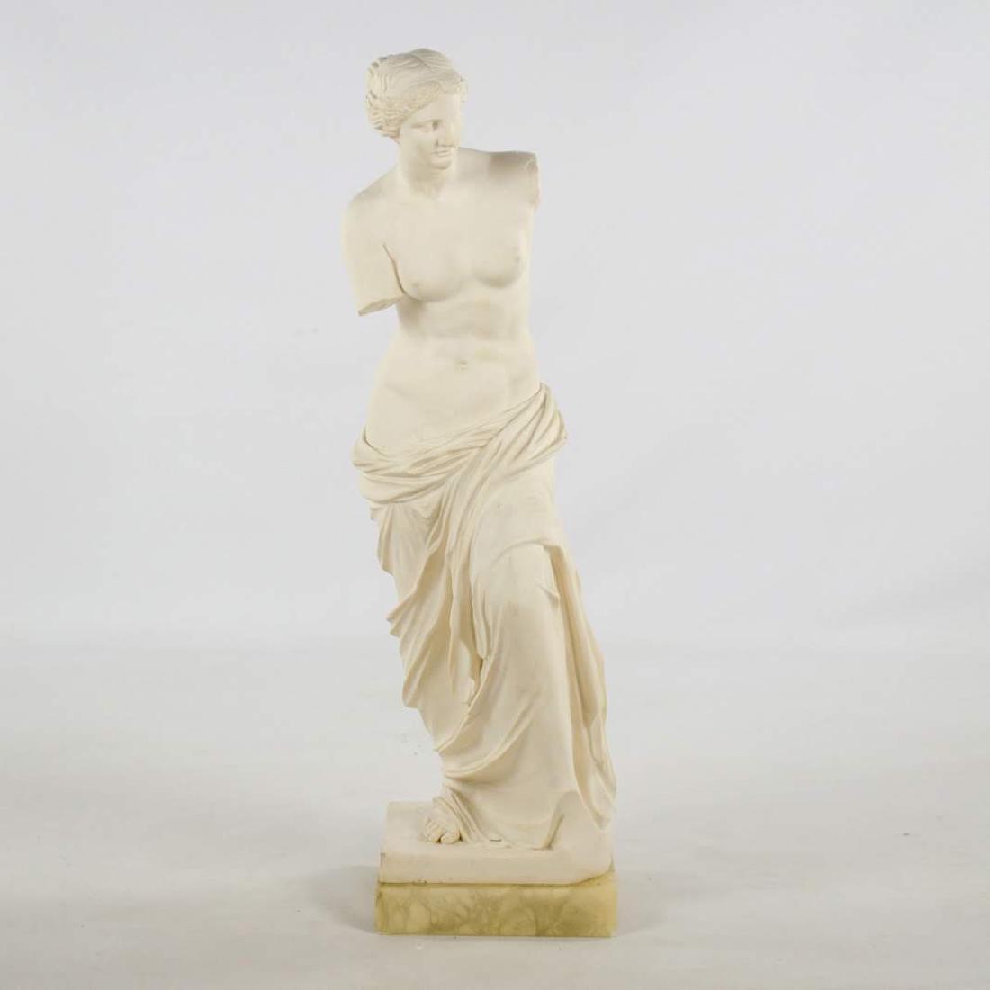 Arnaldo A. Giannelli Signed Marble Sculpture: A signed hand-carved marble sculpture by Arnaldo A. Giannelli. This work depicts a woman with her lower half draped in fabric. It is signed near the base. Dimensions: 35 x 9.5 x 9.5 Flat Rate Shipping