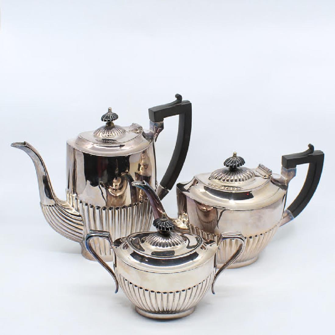 Sheffield "My Lady" Silver-Plated Tea Set: A vintage Sheffield "My Lady" silver-plated tea set. Each piece is marked "My Lady Made In Sheffield England EP 05" on the underside. Dimensions: 8.5 x 10.25 x 4.25 (for one) Flat Rate Shipping (not c