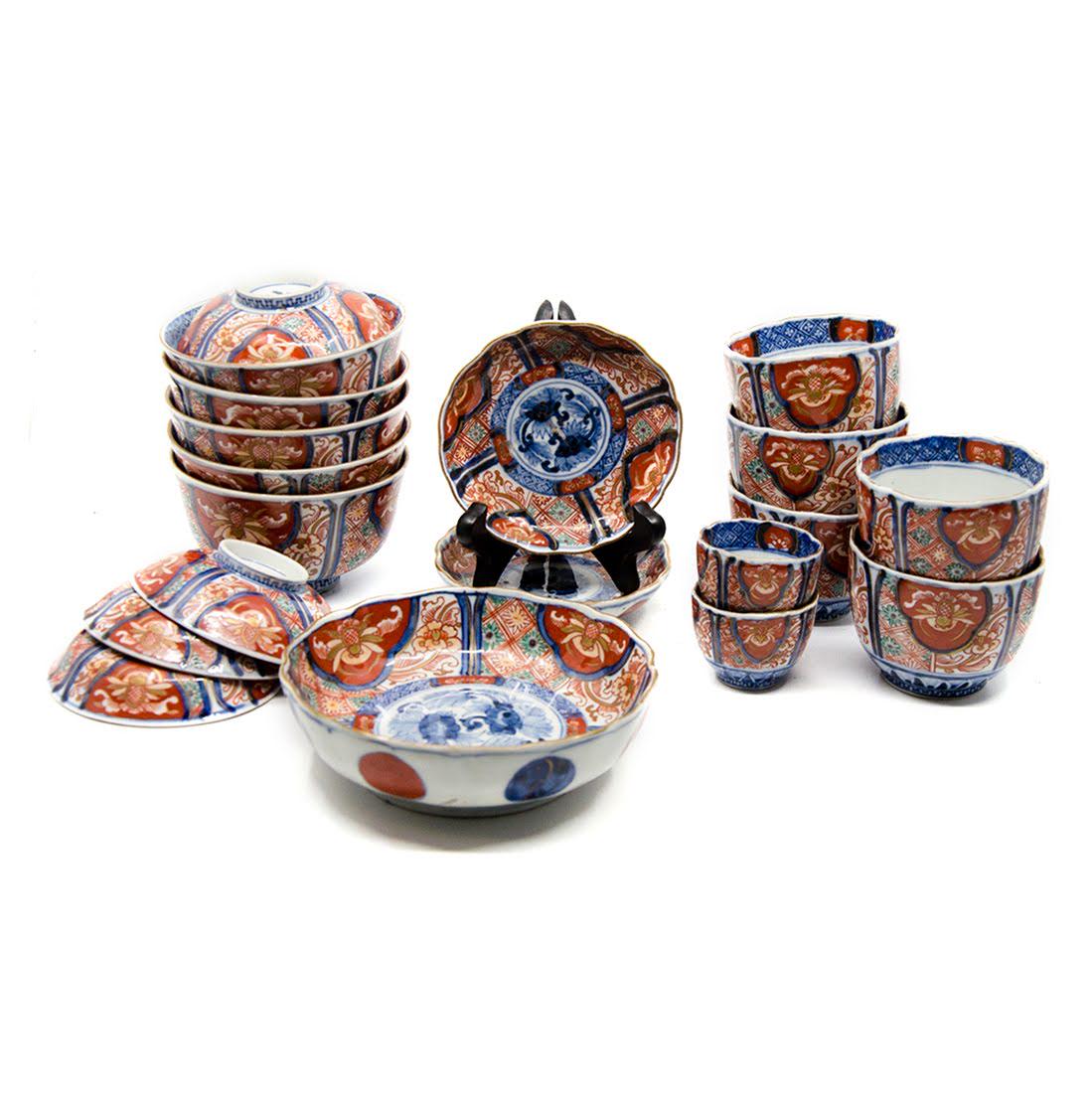 Set of Antique Imari Porcelain: A set of antique Imari porcelain. This lot includes five rice bowls, four lids, two small scalloped rim bowls, one large scalloped rim bowl, five large cups, and two small cups. Each piece is marked o