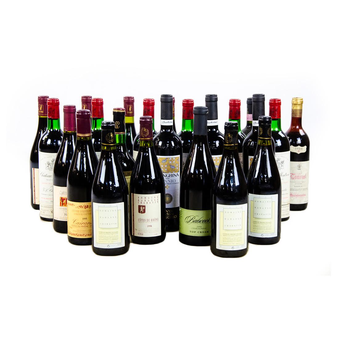 Collection of Vintage Wine: A collection of vintage wine including Domaine Rabasse Charavin 1998 and 2000, Chateau Montrose Saint-Estephe 1980 and several others. This lot includes 24 bottles. Condition: Wear consistent with age