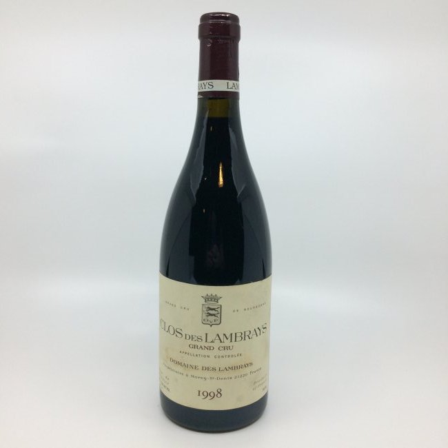 1998 Domaine des Lambrays Clos des Lambrays: A single bottle of 1998 Domaine des Lambrays Clos des Lambrays. Bottle has been stored in a modern wine cooler cabinet for the entirety of its life. The condition is assumed to be good however we are 