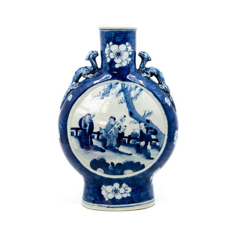 Chinese Asian Blue and White Urn Vase: Chinese blue and white urn or vase depicting characters in landscape with dragon figure handles and marked with Chinese letters on bottom. In very good condition showing minor wear and age, some brown