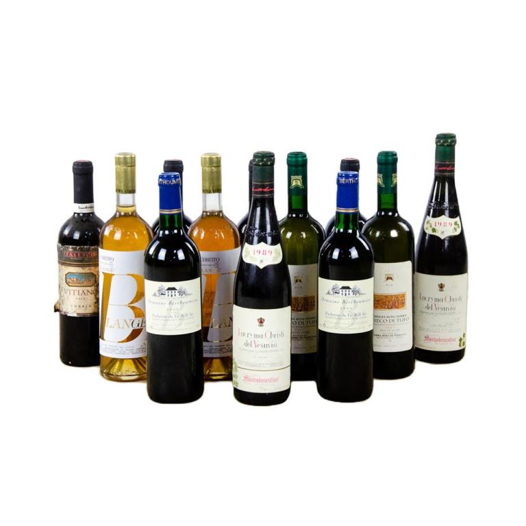 Group of 12 Italy Wine Bottles Including Falesco: Group of 12 full bottles of Italian wine, including 4 Falesco Vitiano Umbria wines from 1999 and 2000, 2 bottles of Domaine Berthoumieu Pacherene du Vic Bilb Sec wines from 1999, 2 Greco Di Tufo white