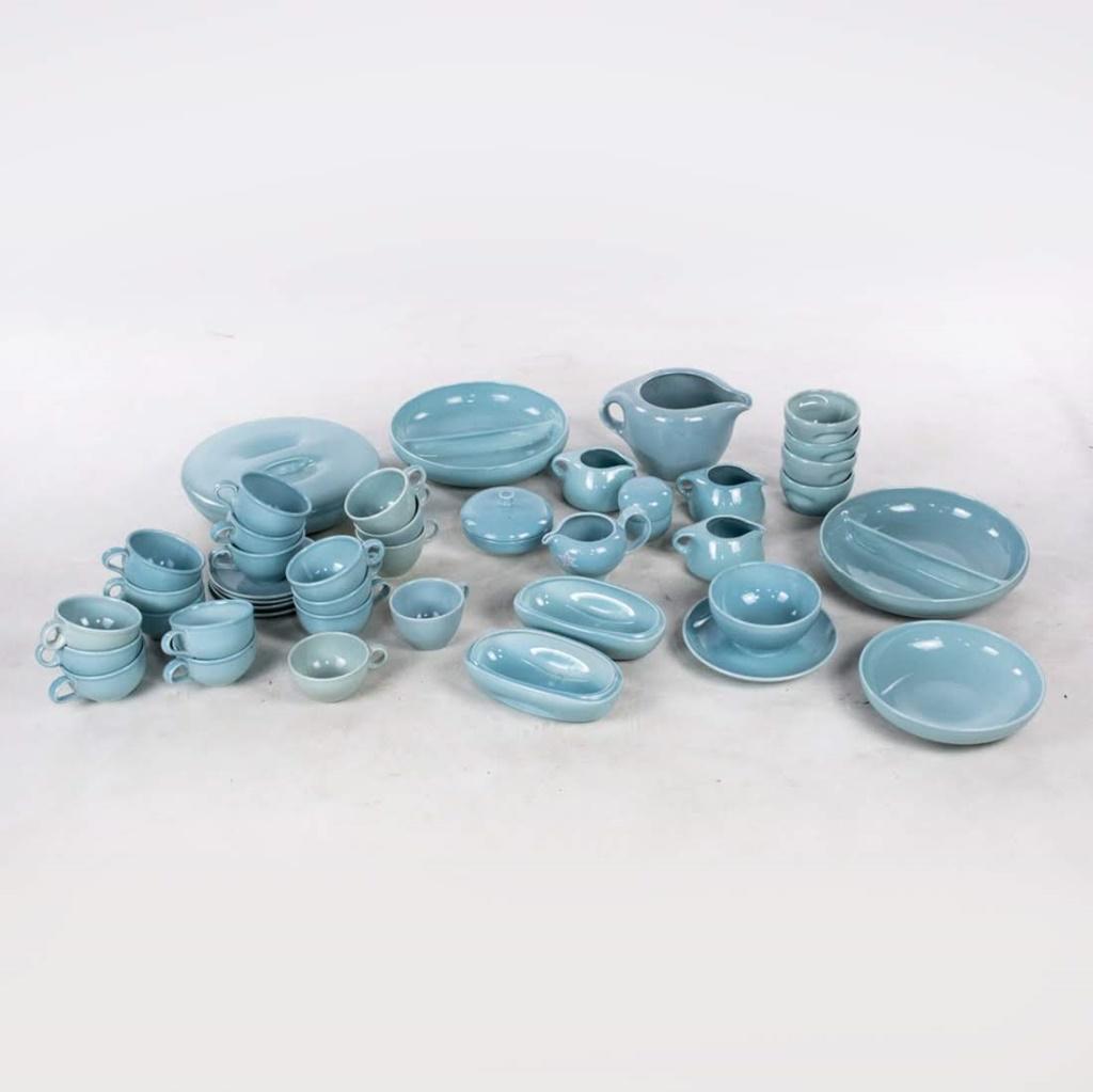 MCM 42 Piece Light Blue Iroquois Tea & Coffee Set by: Mid Century Modern forty-two piece light blue Iroquois tea and coffee set by Russel Wright. Dishes with lid measures 2.5" x 10" in diameter. Each piece is marked and signed.