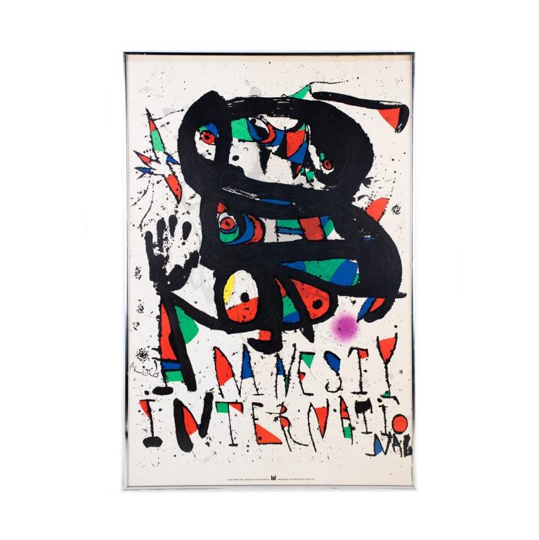 Joan Miro Amnesty International Poster Print: Amnesty International poster print by Joan Miro. Dated 1977. Signed in the plate. Housed in silver frame behind glass. Measures 36.5" x 24.25"