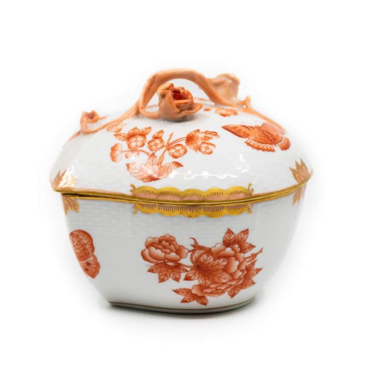 Herend Heart Shaped Porcelain Dish with Lid: Heart shaped porcelain dish with lid by Herend (Hungary). White porcelain with coral and brown butterflies and rose motif. Lid's handle fashioned after rose vine. Lips of lid and jar are adorned with
