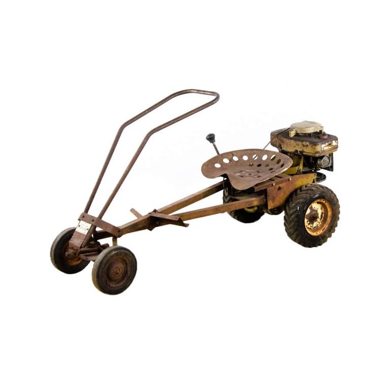 A rare 1958 Lawn Boy Model 9200 Loafer mower attachment: A rare 1958 Lawn Boy Model 9200 Loafer mower attachment that allowed for one to attach a push mower and turn it into a riding mower. Untested, condition unknown. Appears to be complete. Dimensions: 30