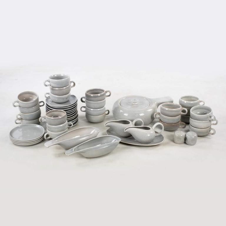 MCM 49 Piece Gray Glazed Stoneware China Set by Russel: Mid-century Modern forty-nine piece gray glazed stoneware china set by Russel Wright (Mfg. by Steubenville). Set includes: one fondue pot with lid, two creamers, two sauce boats, one oval serving plat