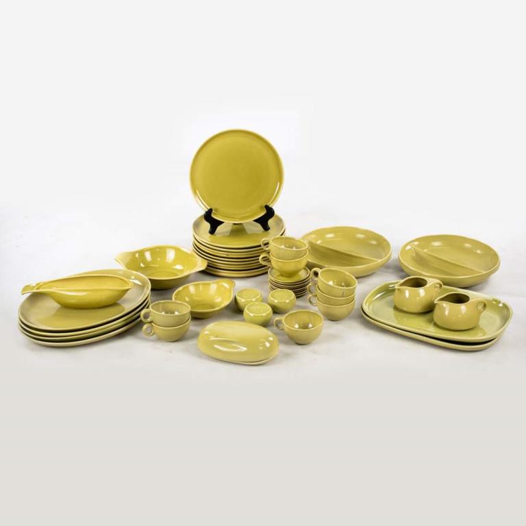 45 Piece Chartreuse Glazed Set by Russel Wright: Mid-century Modern 45 piece lime green glazed stoneware china set by Russel Wright (Mfg. by Steubenville). Each piece is marked. Large plate // Oval Serving Plate measures: 10" // 10" x 12.75".