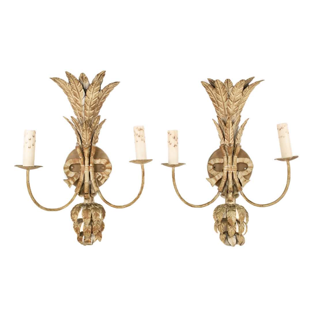 Pair of Fabricated Metal Electrical Wall Sconces: Pair of fabricated metal electric wall sconces. Both sconces are fashioned with both, upright and drooping acanthus leaves. Both pieces measure 19" x 15"