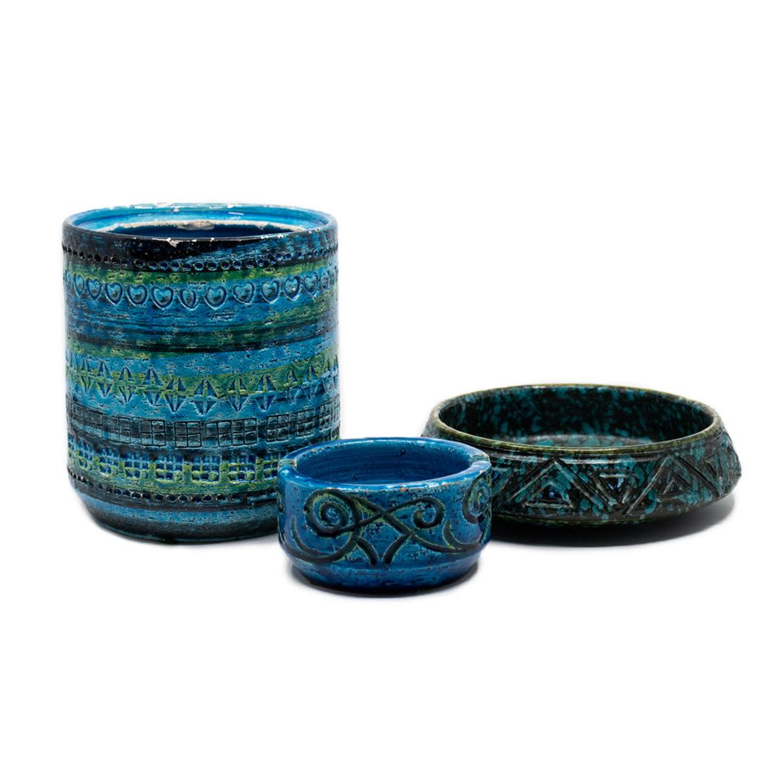 Group of 3 Italian Blue Bitossi Pottery Pieces: A group of 3 Rosenthal-Netter Italian pottery pieces in shade of Rimini Blue. The group includes an Aldo Londi geometric pattern vessel, a glazed bowl with geometric patterns and a small ashtray. They