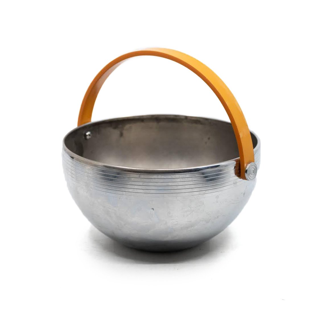 Russel Wright for Chase Bakelite Chrome Ice Bowl: A Bakelite and chrome ice bowl designed by Russel Wright for Chase. Bowl is in good condition with minor wear commensurate with age and use. Bowl is marked, "Chase, USA" on the bottom and measures 7"