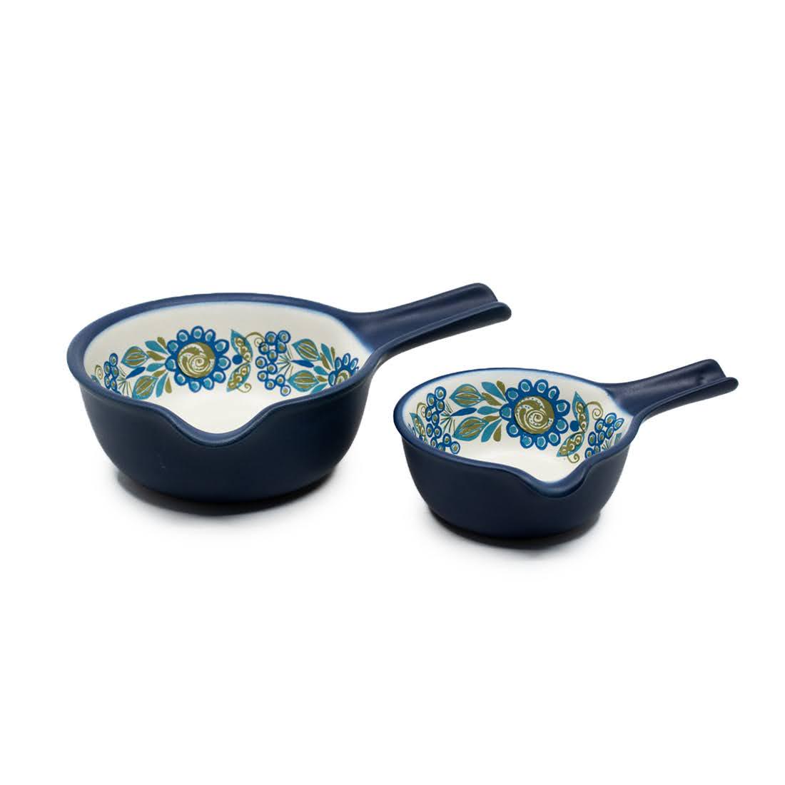 Pair of Figgjo Flameware Tor Viking Norway Sauce Pans: A pair of Figgjo Flameware Tor Viking saucepans in two sizes with pour spouts and handles. Made in Norway, they are both marked on the underside. The smallest pan measures 2.5" x 7" x 5".