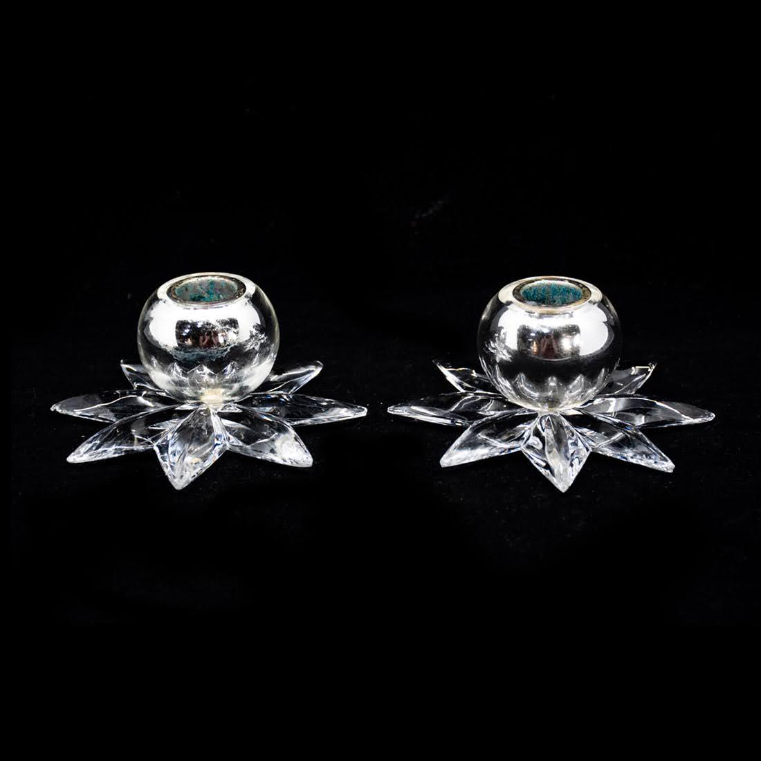 Steuben Mercury Glass & Crystal Starburst Candle: A pair of 1930's Steuben mercury glass and crystal starburst design candle holders #7512. They are marked on the underside.