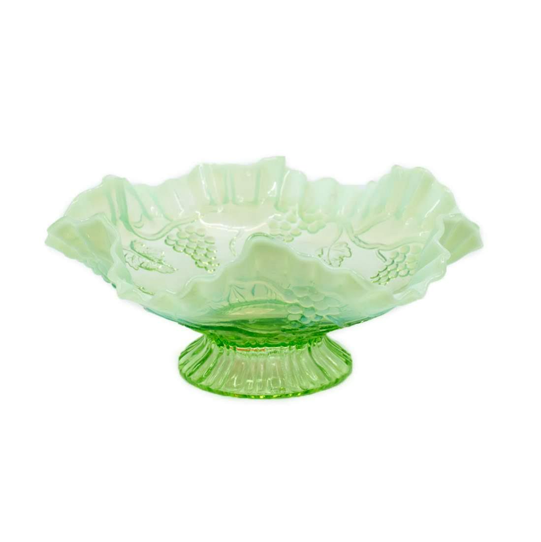 Opalescent Rim Ruffled Depression Glass Dish: A green dish with grape embossed design and opalescent rim with ruffled body on starburst lined base. Measures 8" W by 4" H