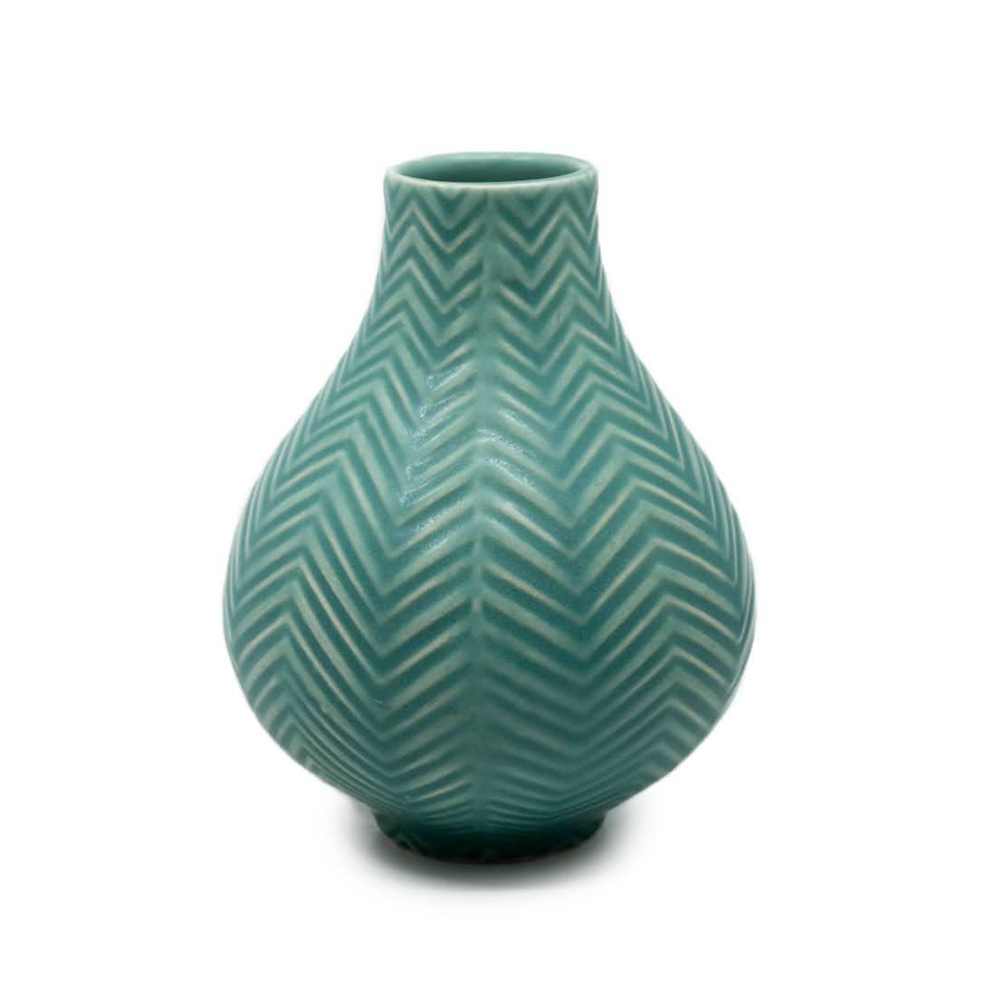Jonathan Adler Textured Blue Vase: A Jonathan Adler blue textured vase with geometric pattern. It is marked on the underside.
