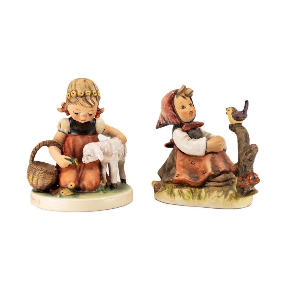 Goebel Hummel In Tune 414 and Favorite Pet 361: Goebel Hummel #414 In Tune TMK 6 figure, featuring a young girl singing with a bird and #361 Favorite Pet TMK 6, featuring a young girl with flowers in her hair feeding a lamb.