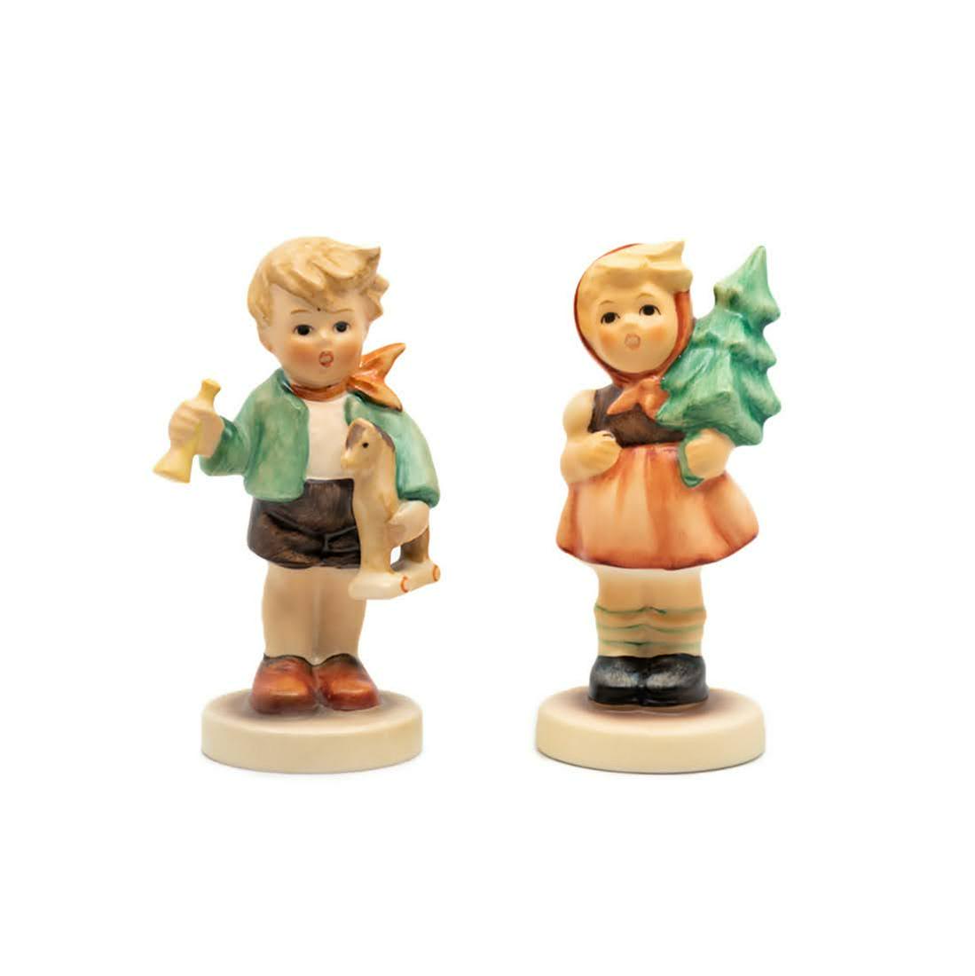 G. Hummel Boy with Horse 239/C and Girl with Fir Tree: Goebel Hummel #239/C Boy with Horse TMK 8 figure, featuring a young boy holding a small horse under his arm and #239/D Girl with Fir Tree TMK 8 figure, featuring a young girl holding a small fir tree.
