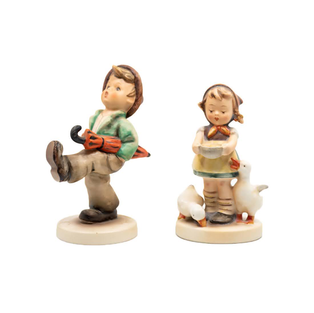 G. Hummel Happy Traveler 109 and Be Patient 197/2: Goebel Hummel #109 Happy Traveler TMK 6 figure, featuring a young boy whistling while walking and #197/2 Be Patient TMK 197/2/0 TMK 2 figure, featuring a young girl feeding a pair of geese.