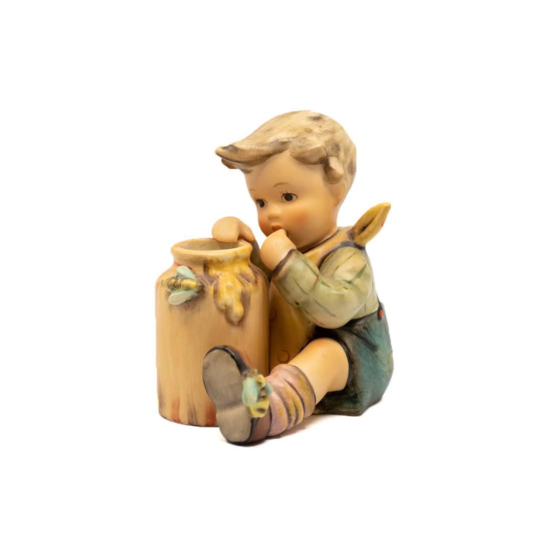 Goebel Hummel Honey Lover 312 Figure: Goebel Hummel #312 Honey Lover TMK 2 figure, featuring a young boy eating honey from the jar. This is an Exclusive 1956 Edition.