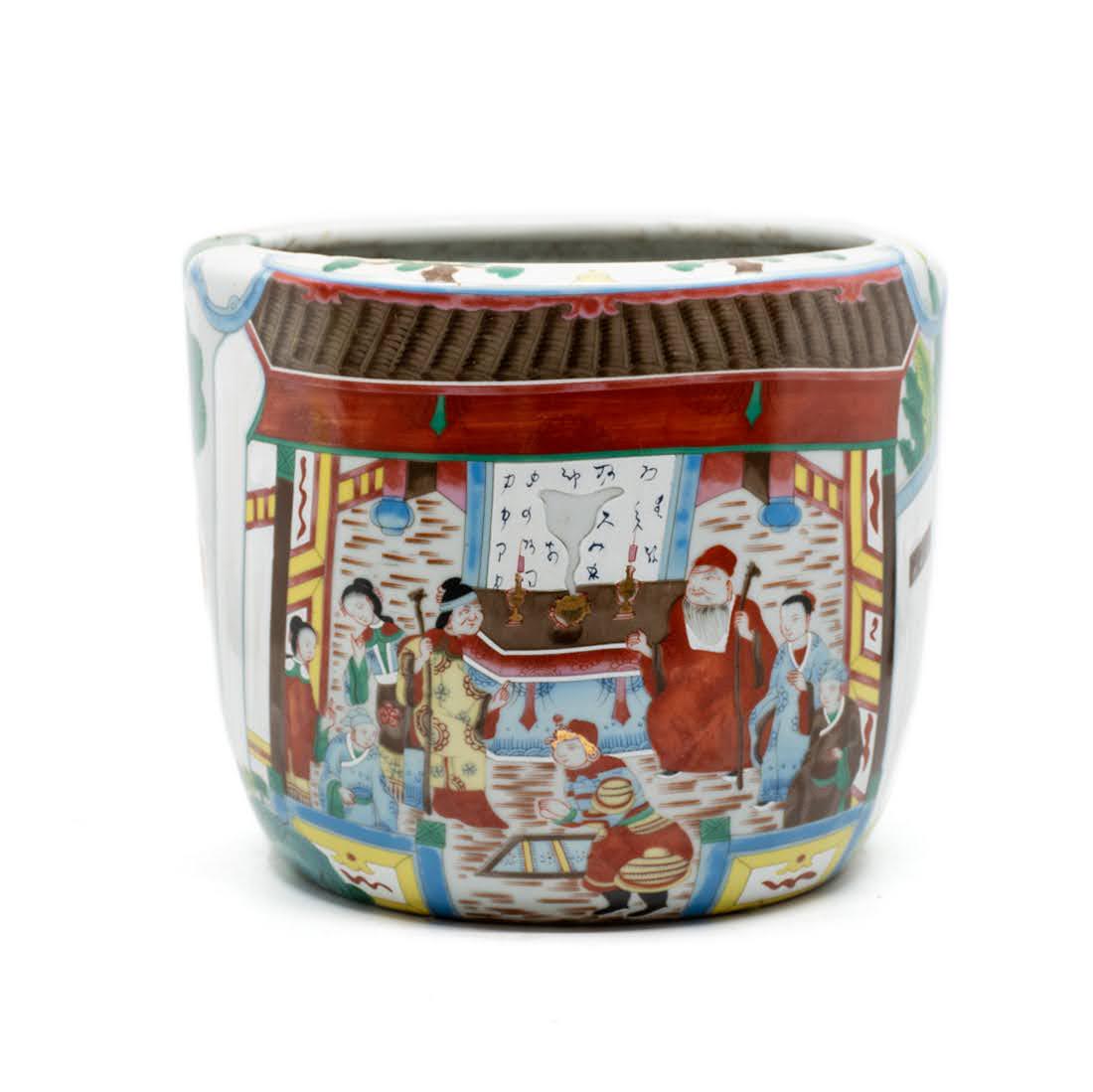 Japanese Hand Painted Porcelain Flower Planter: A small hand painted Japanese porcelain flower pot or planter depicting Japanese feudal court and military scenes.
