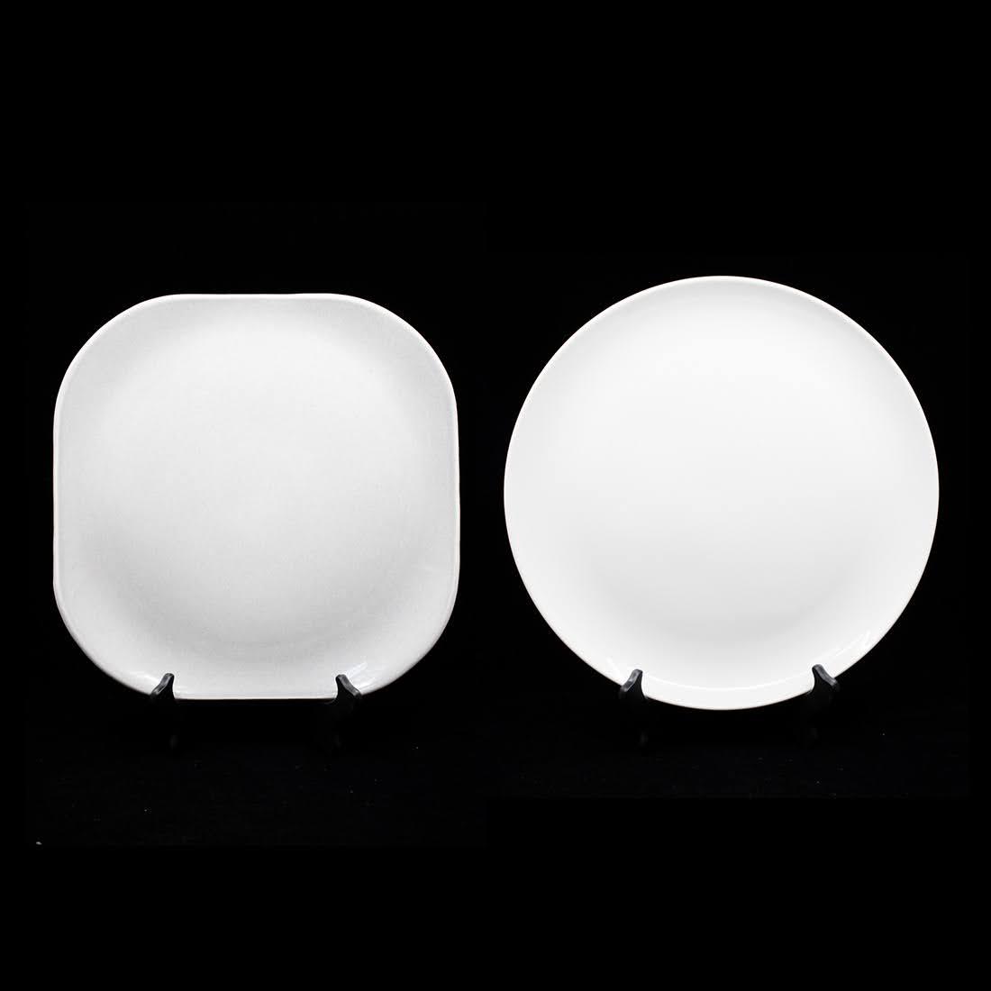 Group of 2 Russel Wright Iroquois and Steubenville: A group of two Russel Wright plates including one square American Modern Granite Steubenville plate and one round Iroquois Casual White plate. Both marked on underside. Measure 13"DIA.