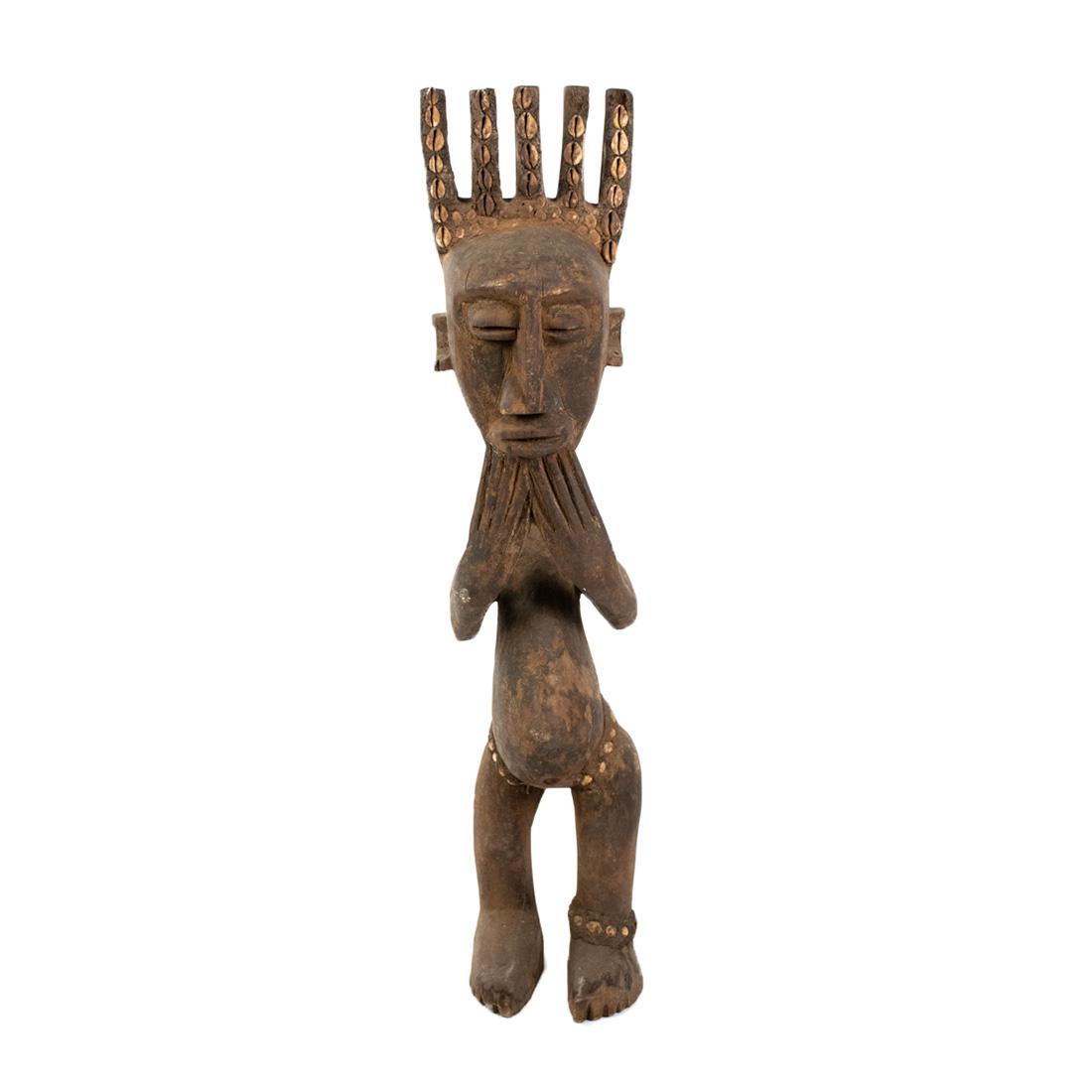 African Mali Bamana N'tomo Bambara 5 Spike Sculpture: An African Mali Bamana Ntomo (20th Century) female ceremonial sculpture constructed of carved wood with inset cowrie shells around waist and inside the on crown.