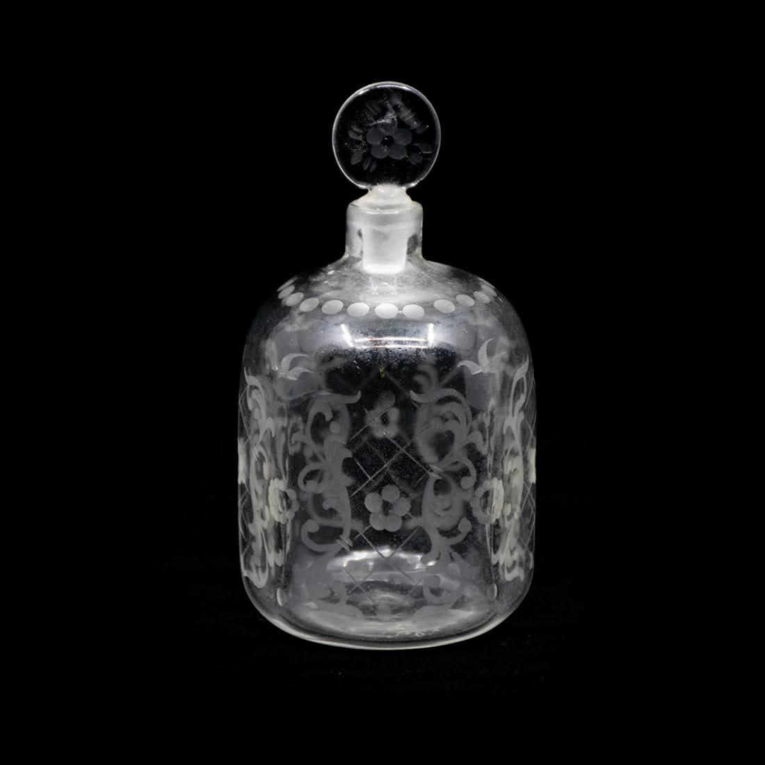 Salir Buccellati Perfume Bottle Murano: A Salir Buccellati Murano perfume bottle having floral etched stopper with round top and lightly etched floral designs on the body. Signed on the underside.