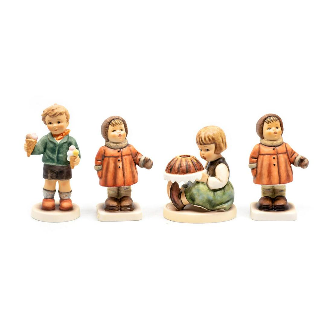 Group of 4 Goebel Hummels including Parlor Pal 2293: Goebel Hummel #2293 Parlor Pal TMK 9 features a boy with ice cream in both hands, #476 Winter Song TMK 6 features a girl singing in a winter coat and mittens, #338 Birthday Cake TMK 6 features a girl
