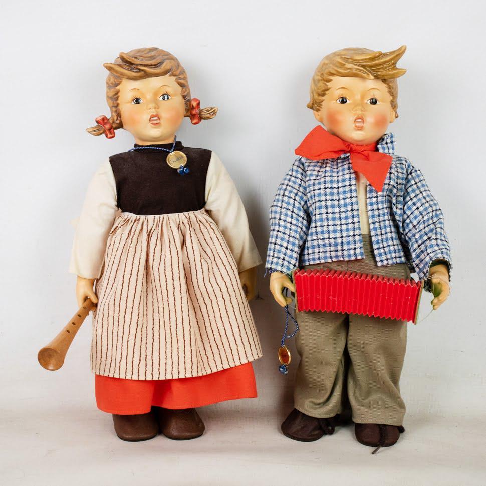 Goebel Hummel Birthday Serenade Boy 718 and Girl 717: Goebel Hummel #718 Birthday Serenade Boy doll TMK 4 and #717 Birthday Serenade Girl doll TMK 4. They are both wearing fabric clothing with accessories and in the original boxes.