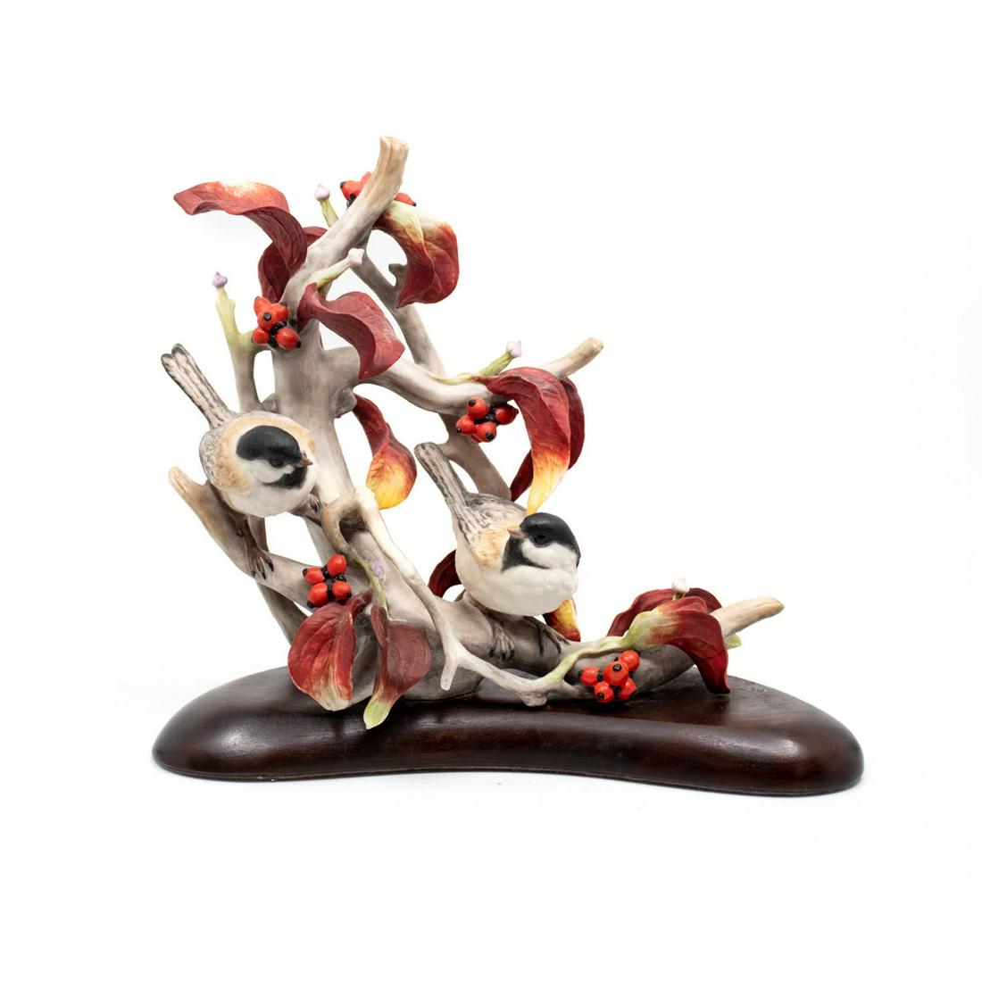 Cybis Autumn Dogwood with Chickadees No. 134: A Cybis Autumn Dogwood with Chickadees no. 134 features two chickadee birds perched in a spray of dogwood flowers and berries. Signed and numbered at the base.