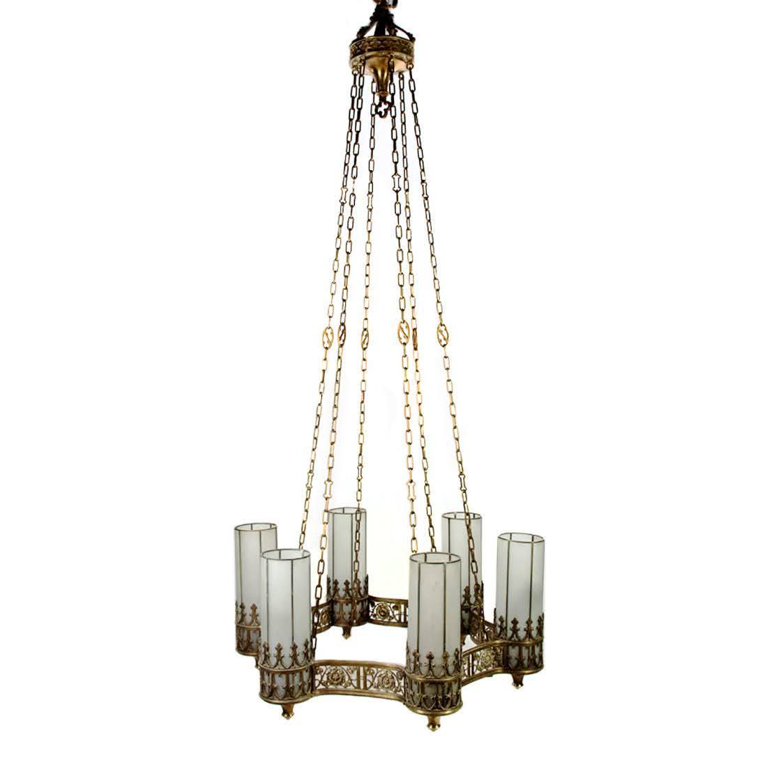 Monumental Neo-Gothic Revival Bronze 6 Light Chandelier: An early 19th century Neo-gothic cast bronze Anglican style monumental six light chandelier with floral medallions around perimeter. Each light has an opaque stained glass shade. Chandelier is over 12