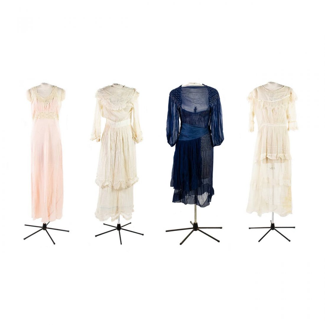 Group of 4 Gibson Girl and Flapper Dresses: A group of antique women's clothing including two white Gibson Girl dresses, a pink embroidered satin slip dress and a blue Flapper dress having blue hip shaw.