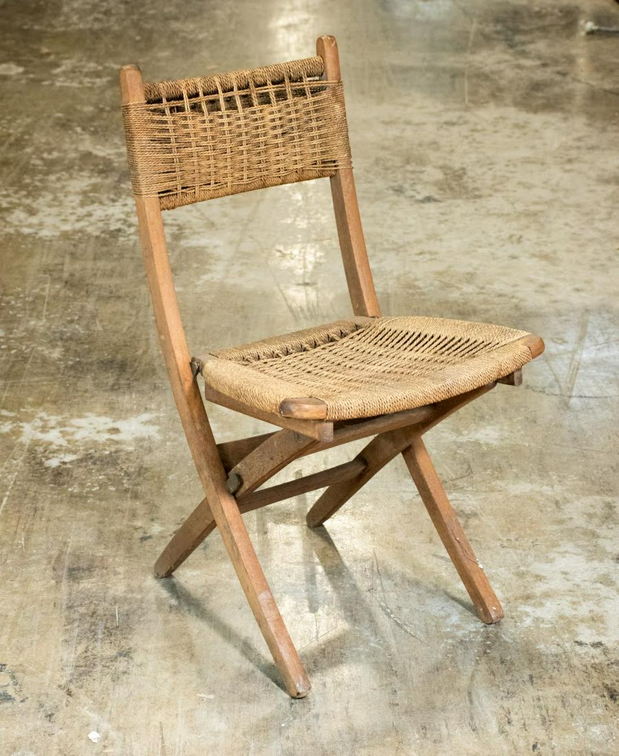 Danish Modern Rope Folding Chair: Danish Modern rope upholstered folding chair with rope backrest and seat in the style of Hans Wegner. Unmarked.