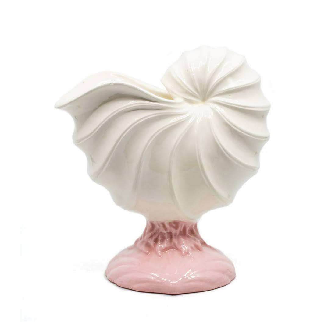 1980's Ceramic Nautilus Form Wine Cooler: A 1980's Art Deco Style ceramic nautilus shell form footed wine cooler having white shell form atop a pink glazed base. Holds one wine bottle. Unmarked.