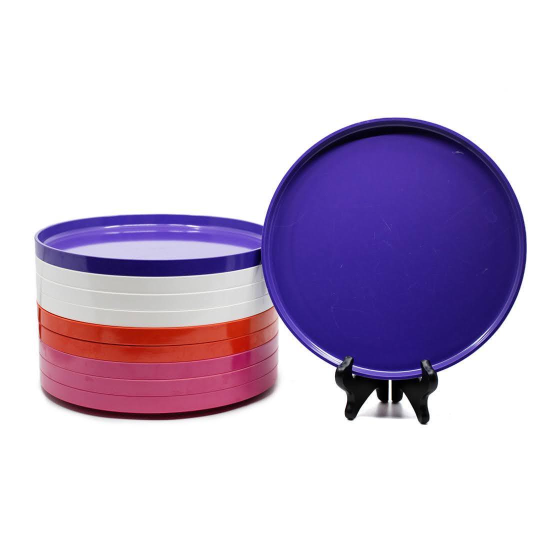 Heller Design by Massimo Vignelli Stacking Plates Set: A 1970's set of 10 Heller Design by Massimo Vignelli mix and match modernist stackable melamine dinner plates. This set includes two purple, three white, two red and three pink plates. They are marked