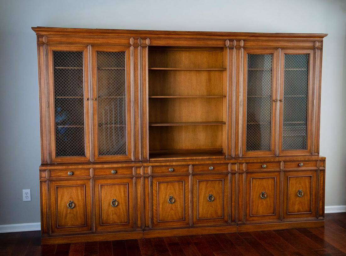 Monumental Henredon French Regency Breakfront Cabinet: A monumental Henredon French Regency style breakfront cabinet consisting of six sections, three door cabinets topped by three closed decks with one triple cornice. Left and right sides have wire mesh 