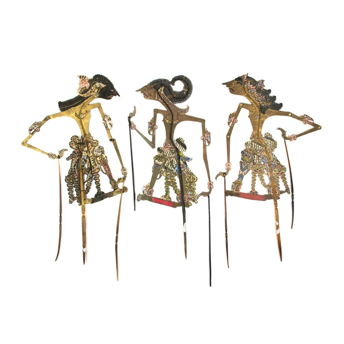 A Group of Three Indonesian Wayang Kulit Puppets: A group of three Indonesian Wayang Kulit flat puppets (c.1900) intricately hand painted on leather hide representing the characters Abimanyu (Yogyakarta), Bambang Irawan (Solo) and Citraksa (Sragen) p