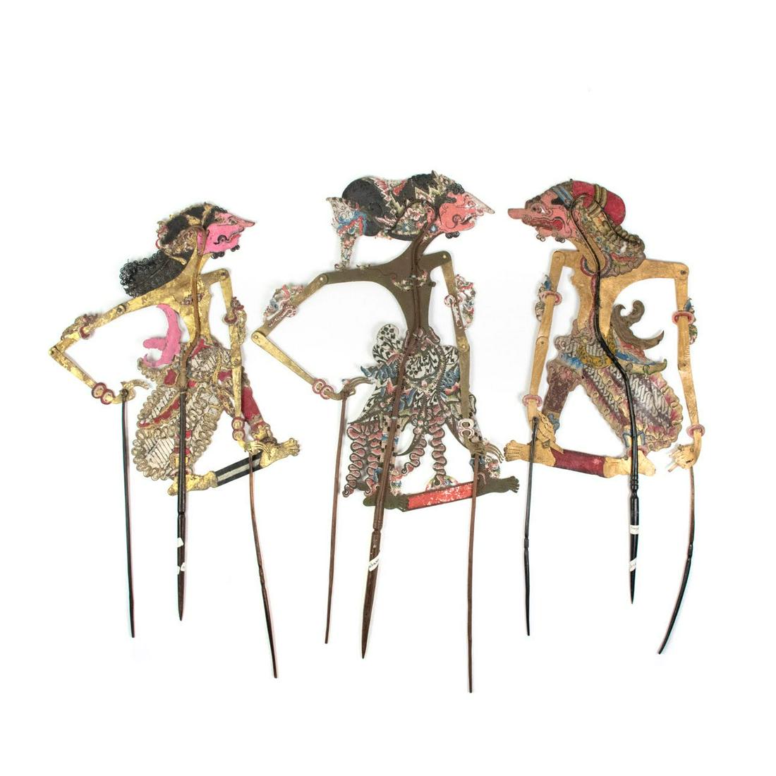 A Group of Three Indonesian Wayang Kulit Puppets: A group of three Indonesian Wayang Kulit flat puppets (c.1900) intricately hand painted on leather hide representing the characters Udono (Brebes), Uisatha (Wonogiri) and Patih Pragoto (Brebes) pictur
