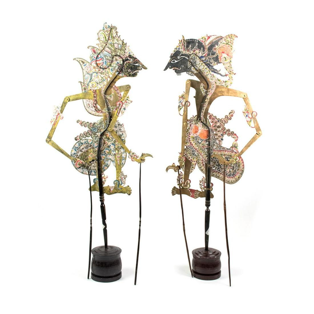 Two Indo Wayang Kulit Prabhu Dwarawati/Drupada Puppets: A set of two Indonesian Wayang Kulit flat puppets (20th century) intricately hand painted on leather hide representing characters Prabhu Dwarawati (left) from Yogyakarta and Prabhu Drupada (right) fro